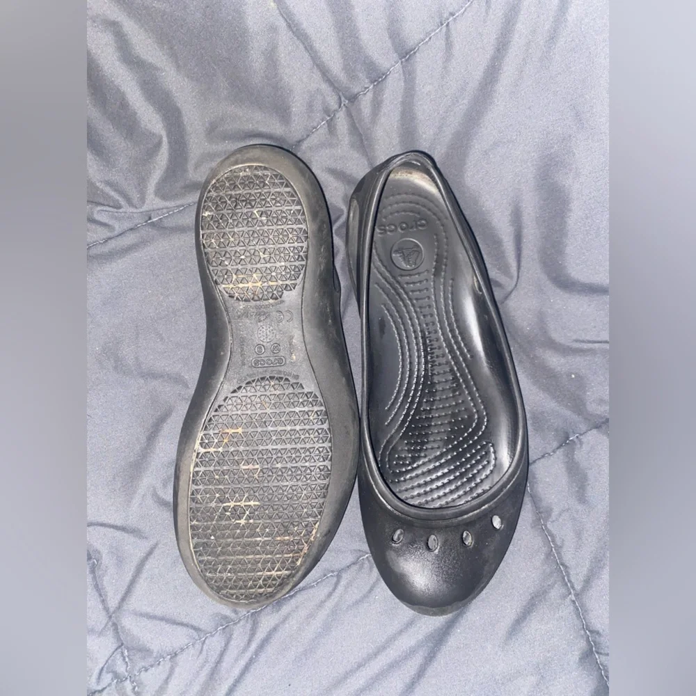 Crocs black ballet flats. Size 9